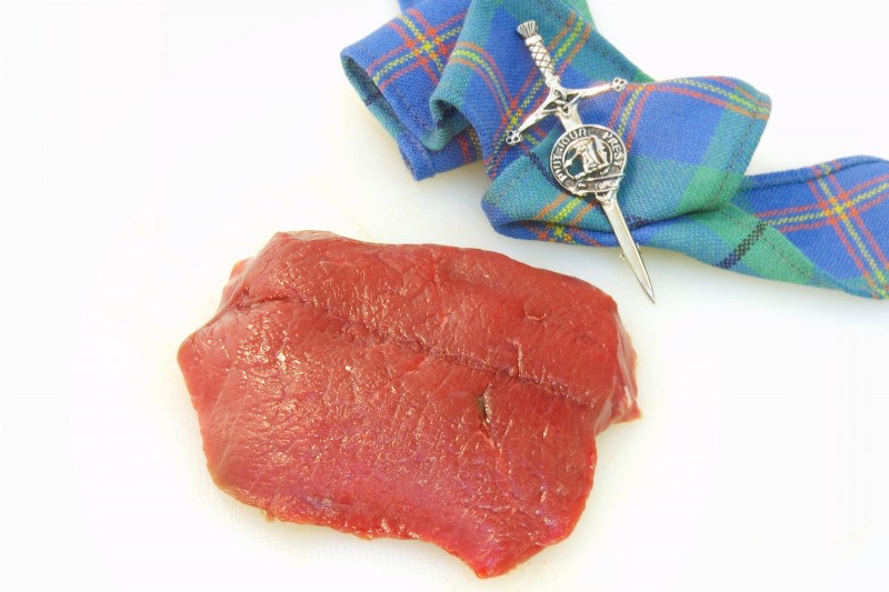 A raw venison sirlion steak